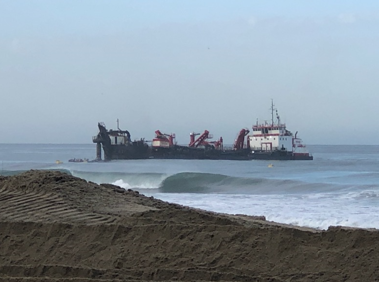 “The Bayport” unloading sediment fill through the subline directly off D-Street beach in Encinitas.